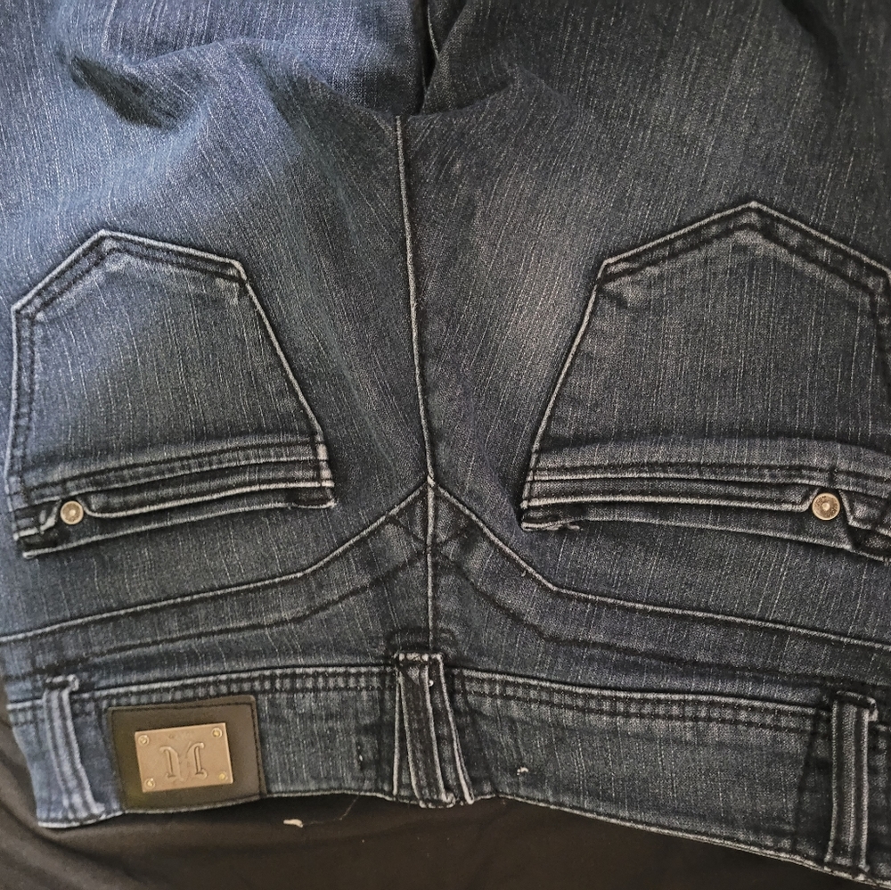 Jolt pants, low rise, and dark blue.
